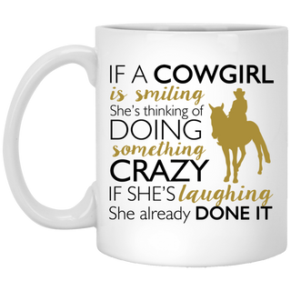 If A Cowgirl Is Smiling Mugs